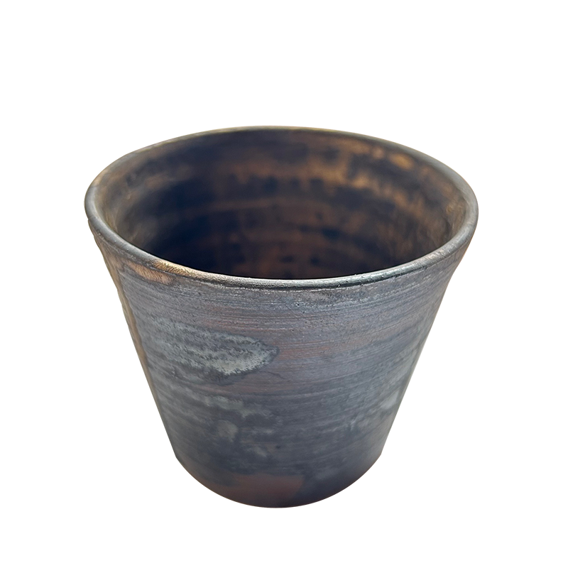 A hand-thrown extra-large soba dipping cup in iron gray with a soft gold wash, viewed from an angled top perspective to highlight its shape and handcrafted texture.