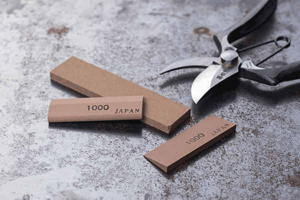 Various thickness and shapes of sharpening stones designed specifically for care and maintenance of high quality garden, floral and sewing scissors