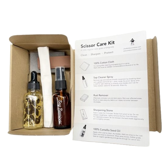 Inside Box containing 5 items of Japanese Garden Scissor Care Kit is Shokunin Store original sap cleaner, rust and sap remover, sharpening stone 1000 grit, 100% camellia tool oil, cotton cloth and instruction.