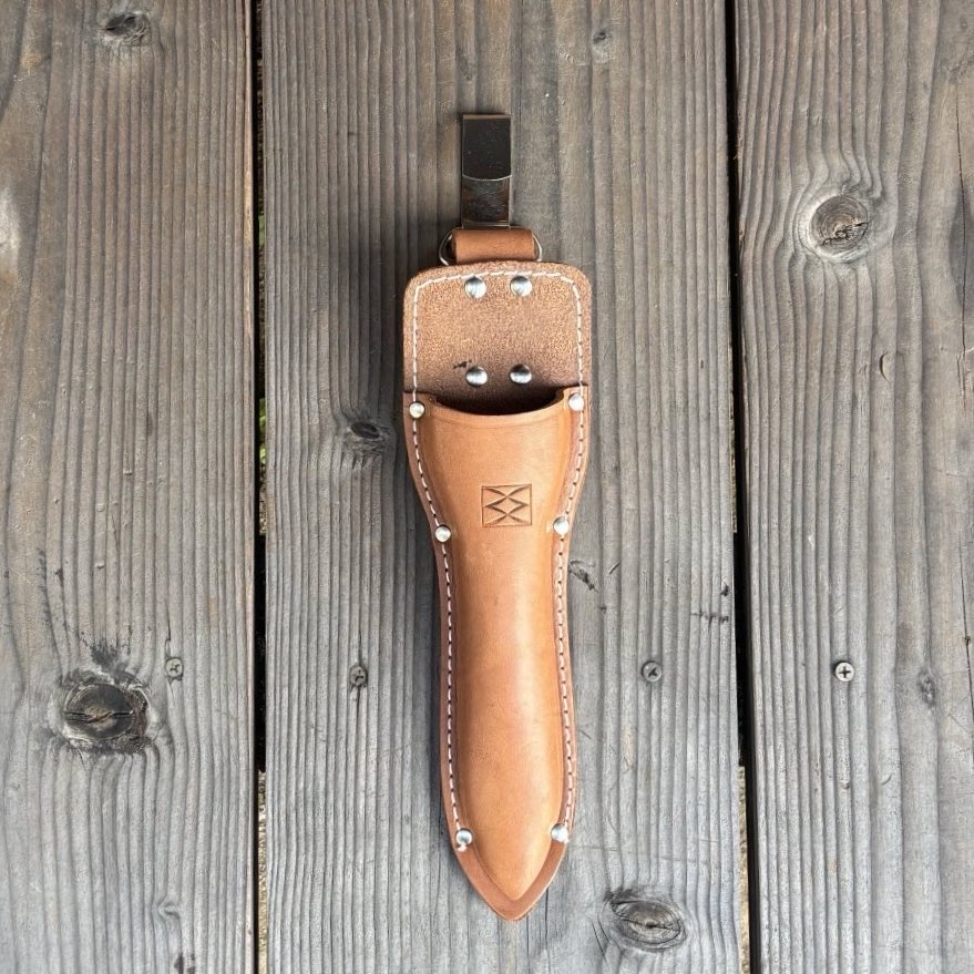 Leather-Holster-for-Kuroco-26cm-topiray_styled-on-wood-deck