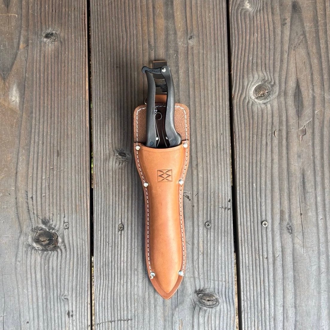 Leather Holster for Kuroco 26cm topiray_styled on wood deck