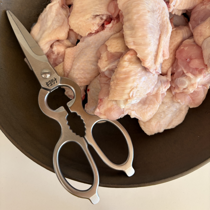 Chef's Kitchen Scissors in Stainless Steel made in Japan with chicken wings