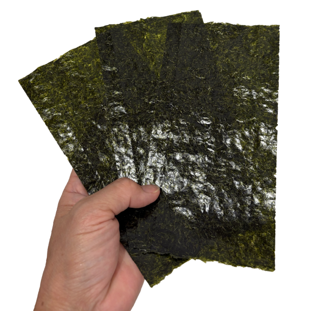 Three Onigiri Nori Half Size Sheets held in hand