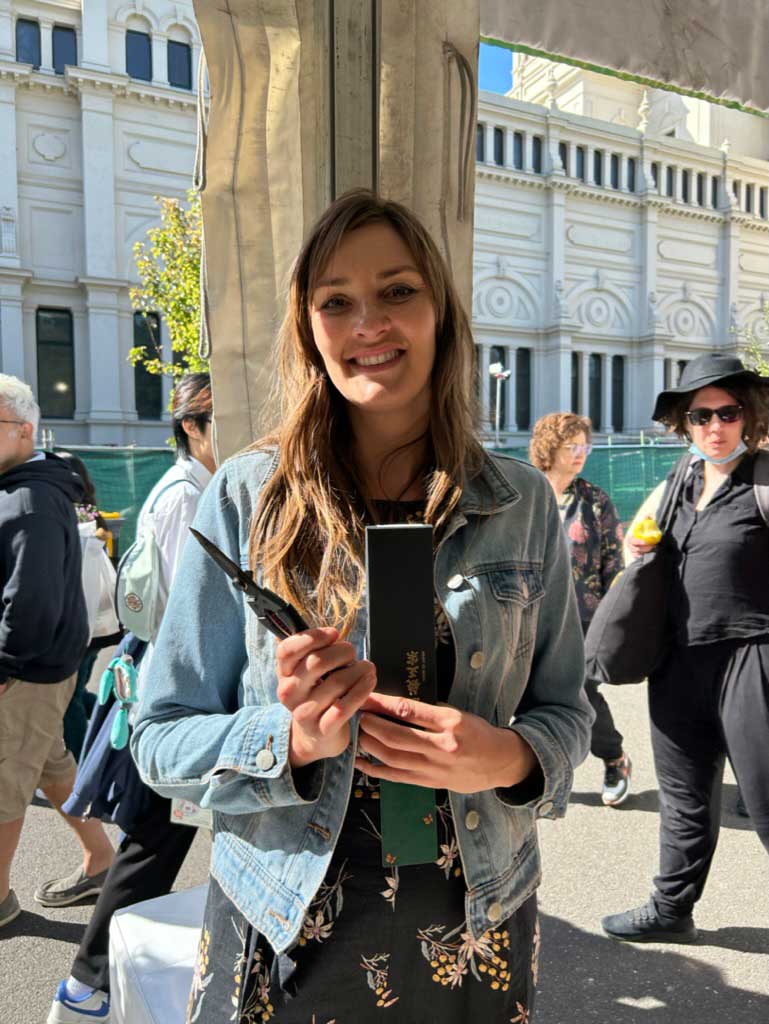 Making history with 5 awards, Emmaline Bowman from STEM Landscape Architecture & Design purchasing Kuroco Pointed Tip Scissors at Shokunin Store.